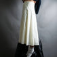 “FENDI” hole pattern and tack designed skirt