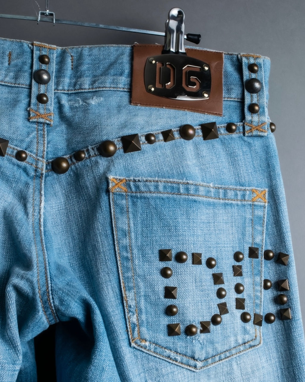 "DOLCE &amp; GABBANA" various studded distressed denim
