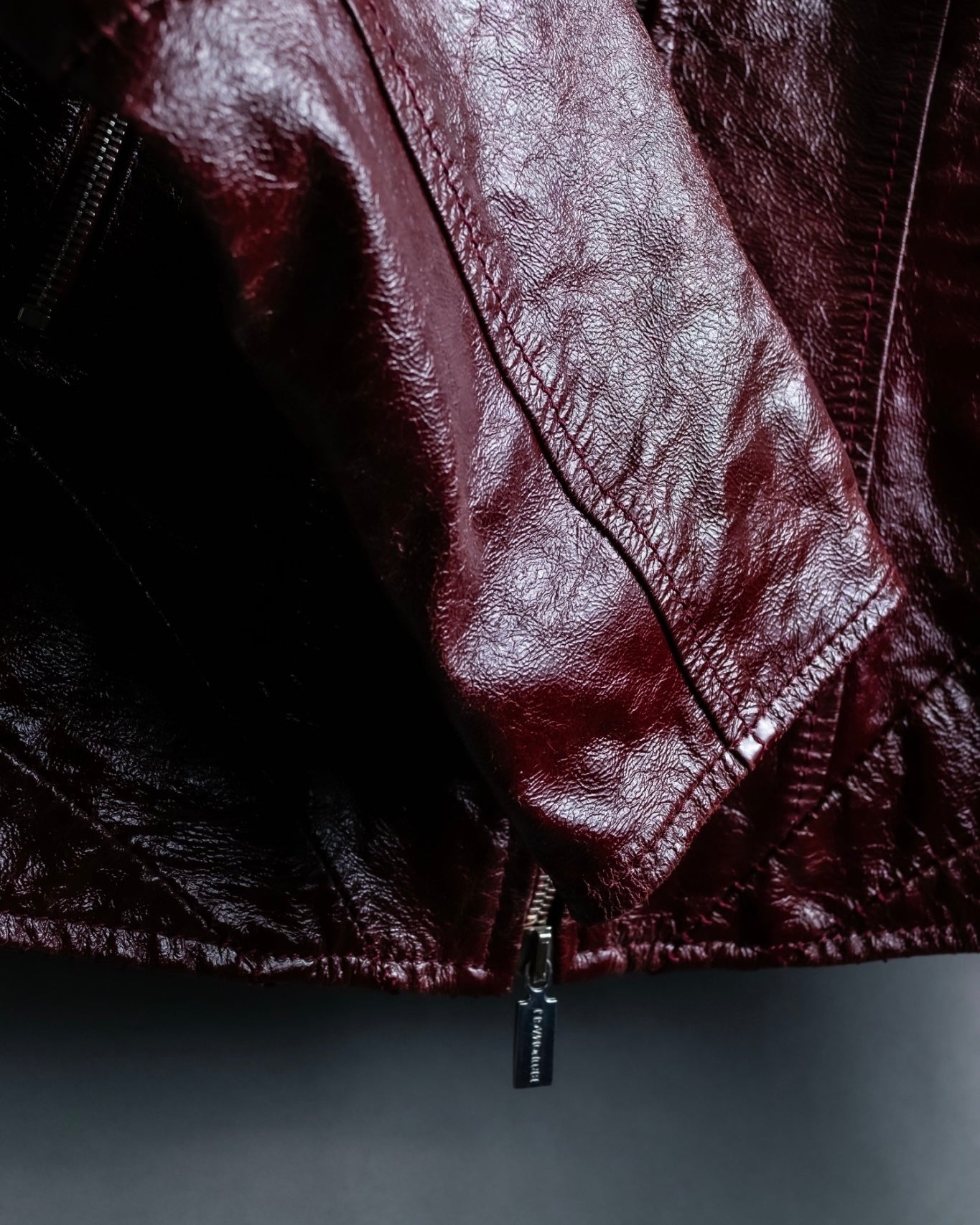 "BRUNOMAGLI" Scratched leather double zip red jacket