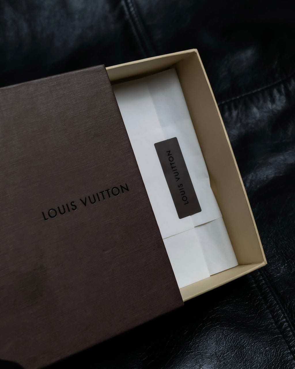 “Louis Vuitton” gold attachment designed monogram wallet