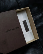 “Louis Vuitton” gold attachment designed monogram wallet