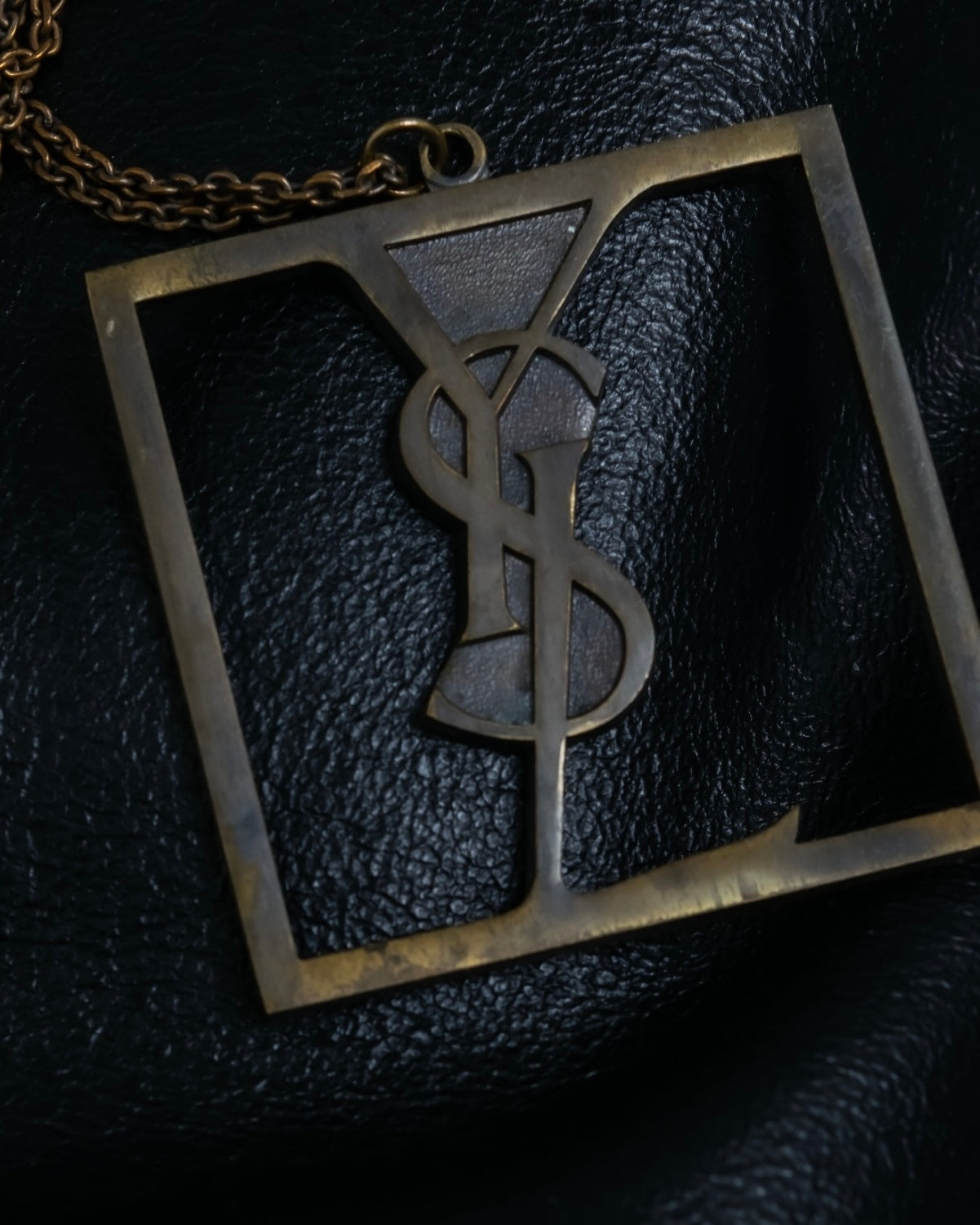 "Yves Saint Laurent" frame design logo motif necklace