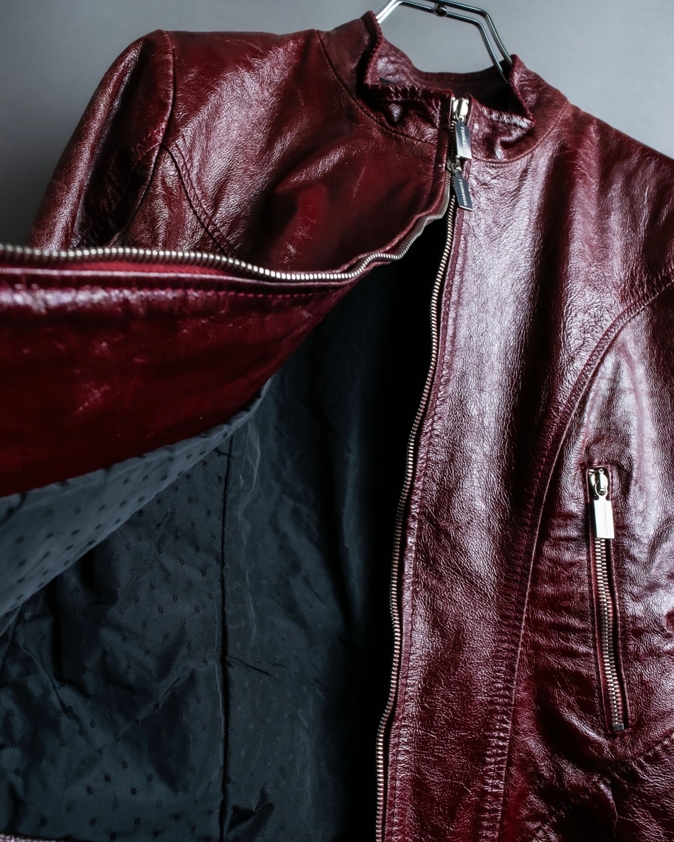 "BRUNOMAGLI" Scratched leather double zip red jacket