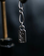 "Yves Saint Laurent"
Different sized beads silver necklace