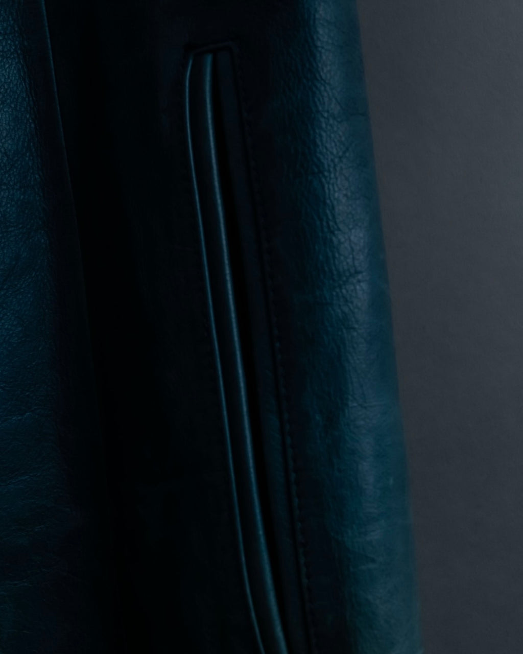 "COACH" light blue faded leather coat