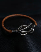 "HERMES" Cross iron bangle