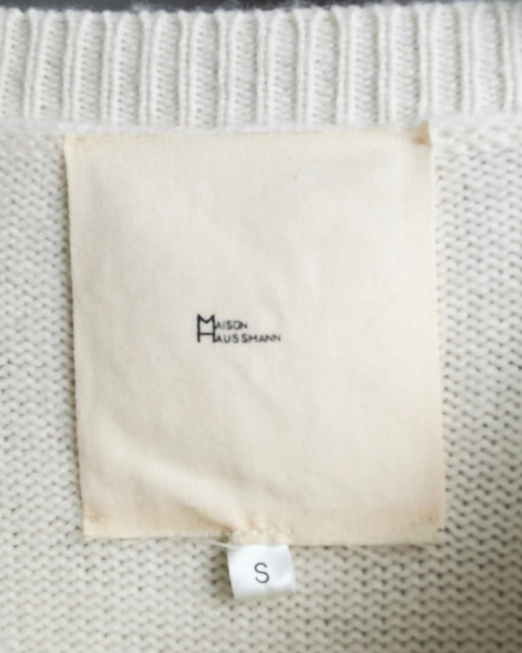 Distressed long sleeve knit