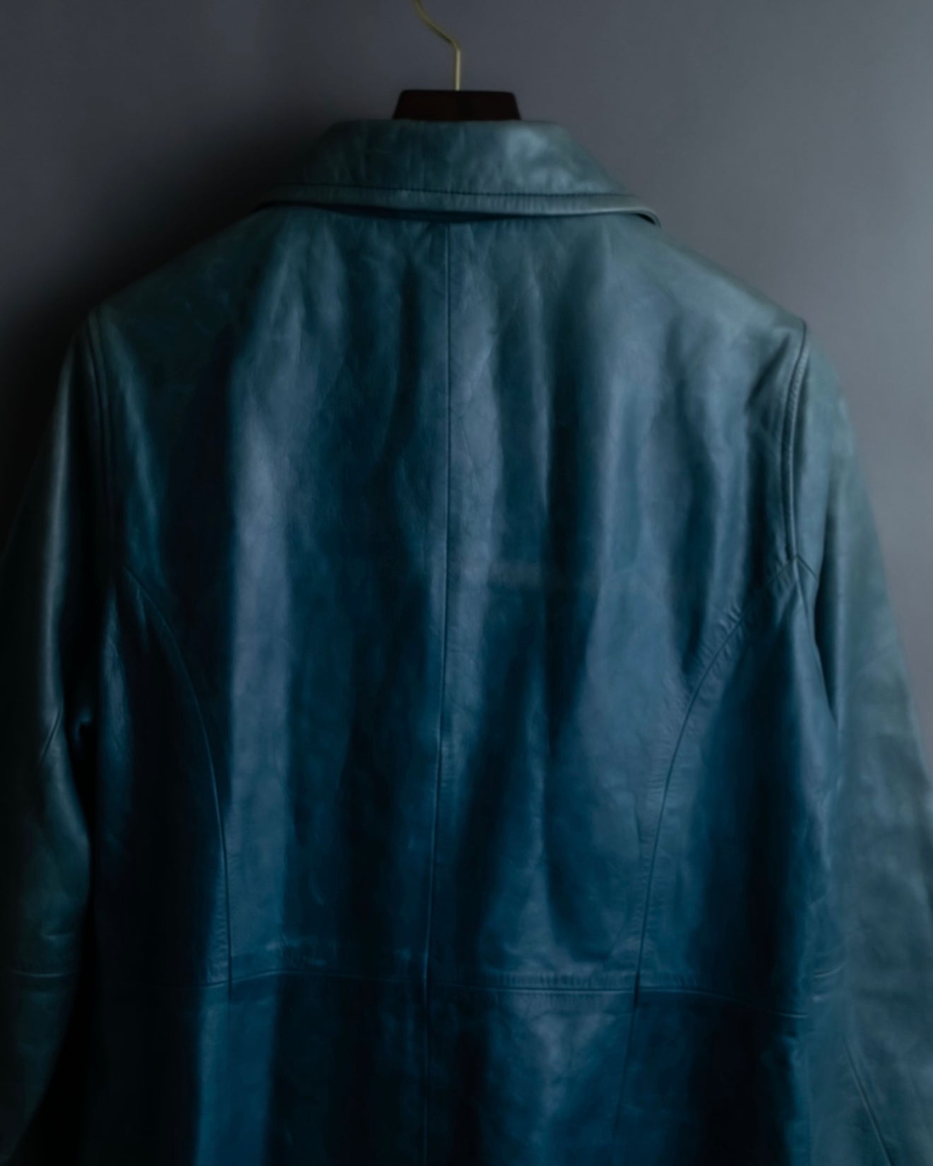 "COACH" light blue faded leather coat