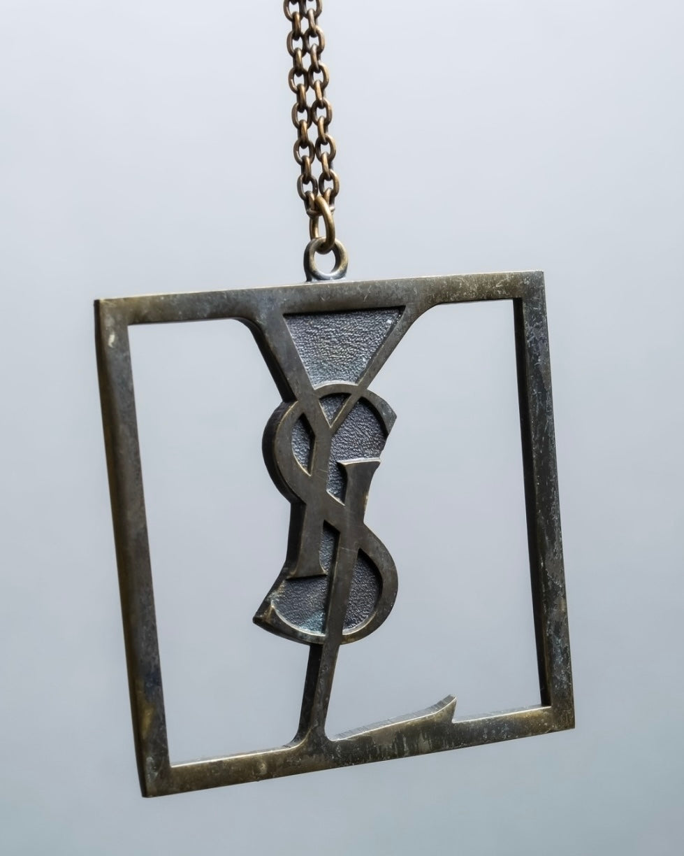 "Yves Saint Laurent" frame design logo motif necklace