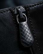 “BOTTEGA VENETA” round toe intrecciato leather boots