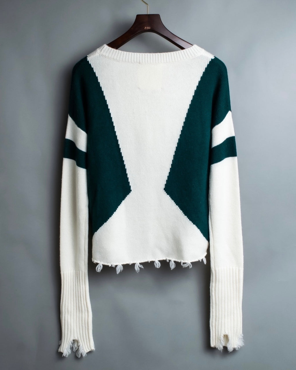 Distressed long sleeve knit