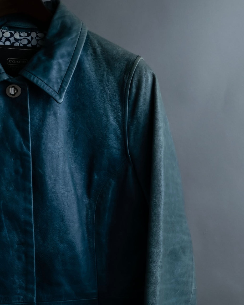 "COACH" light blue faded leather coat