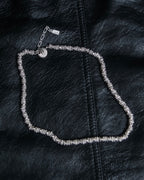 "Yves Saint Laurent"
Different sized beads silver necklace
