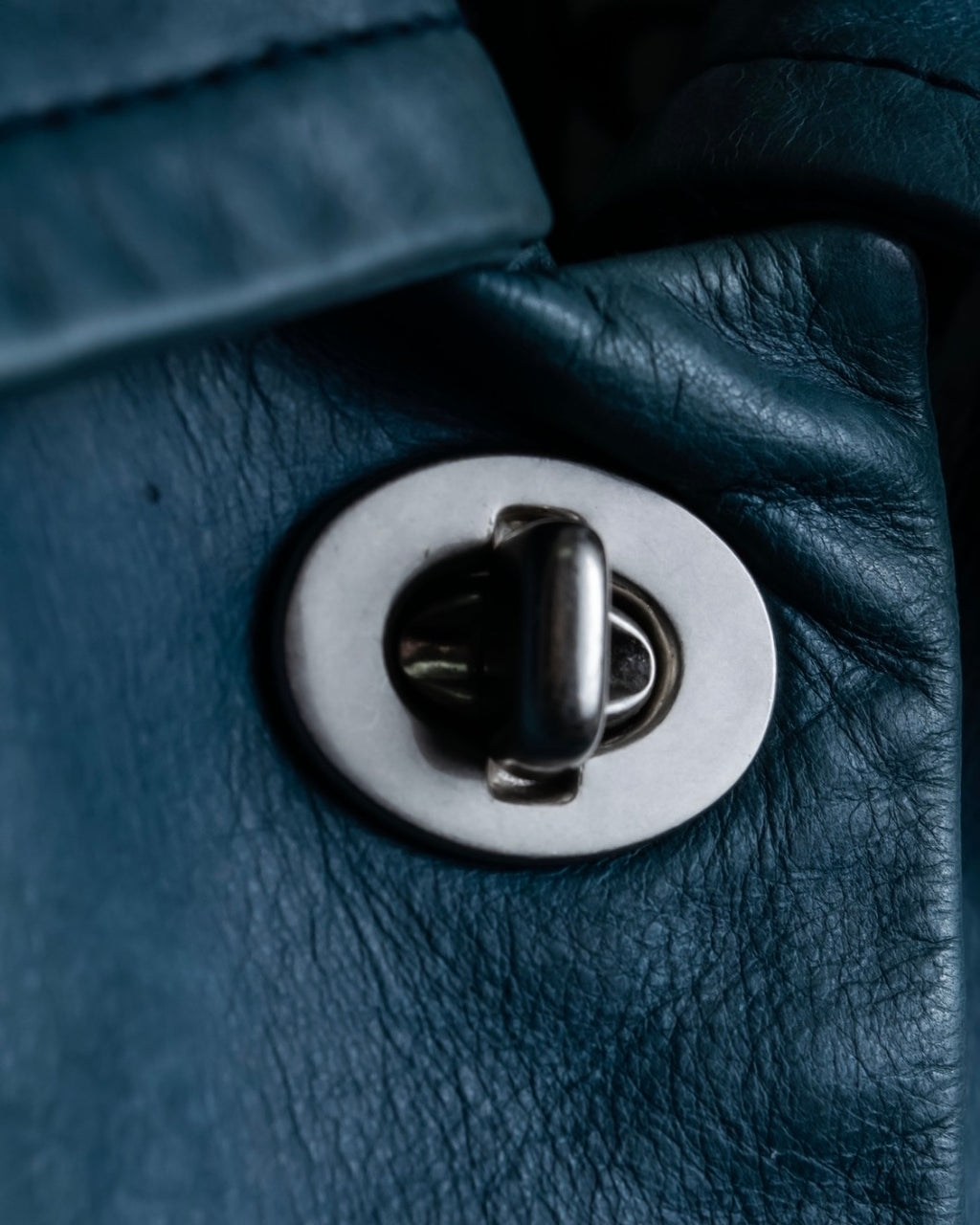 "COACH" light blue faded leather coat