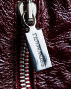 "BRUNOMAGLI" Scratched leather double zip red jacket