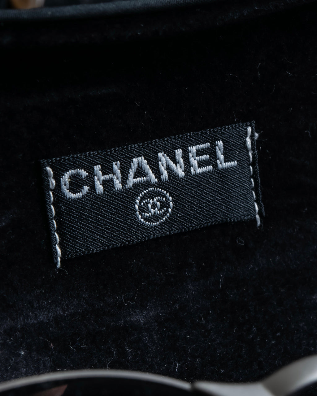 “CHANEL”  metal plate flame oval sunglasses