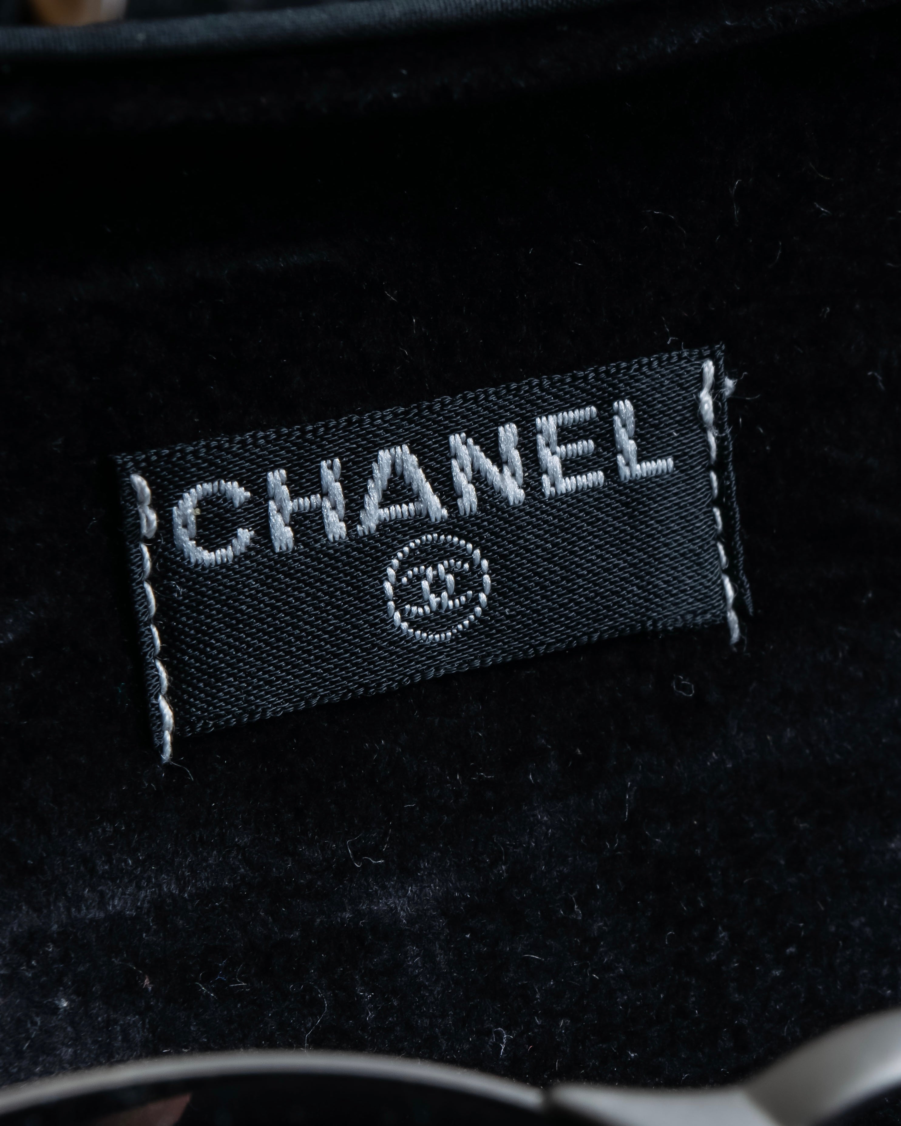 “CHANEL”  metal plate flame oval sunglasses