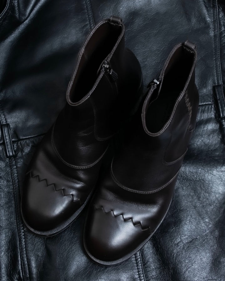“BOTTEGA VENETA” round toe intrecciato leather boots