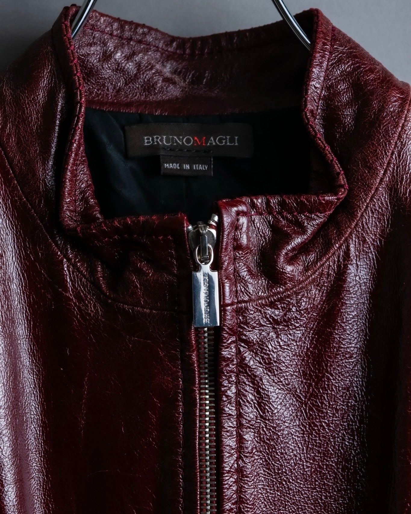 "BRUNOMAGLI" Scratched leather double zip red jacket