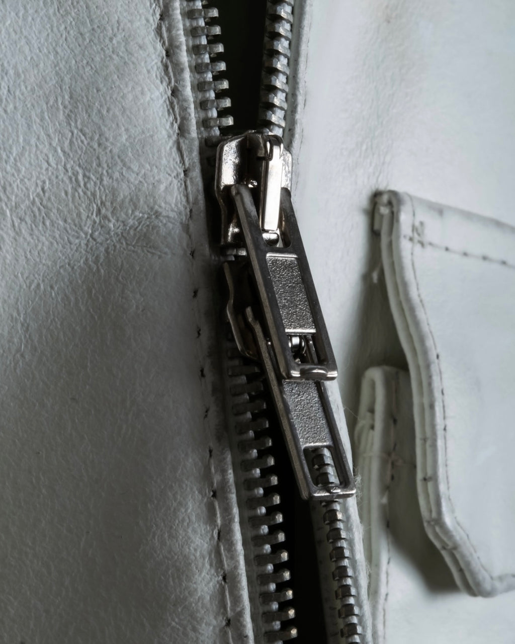 Double zip white leather single riders jacket