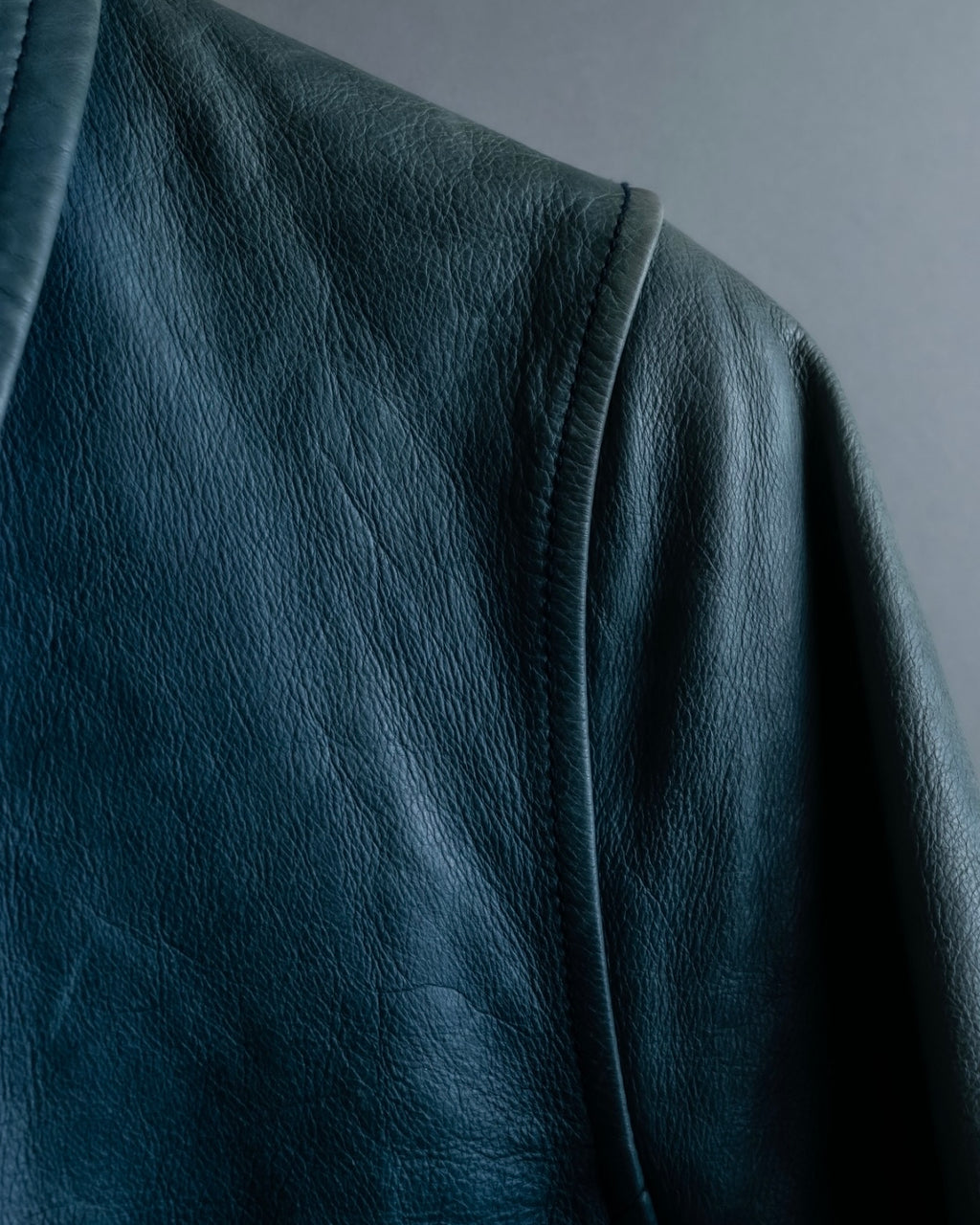 "COACH" light blue faded leather coat