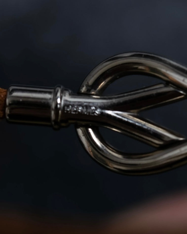 "HERMES" Cross iron bangle