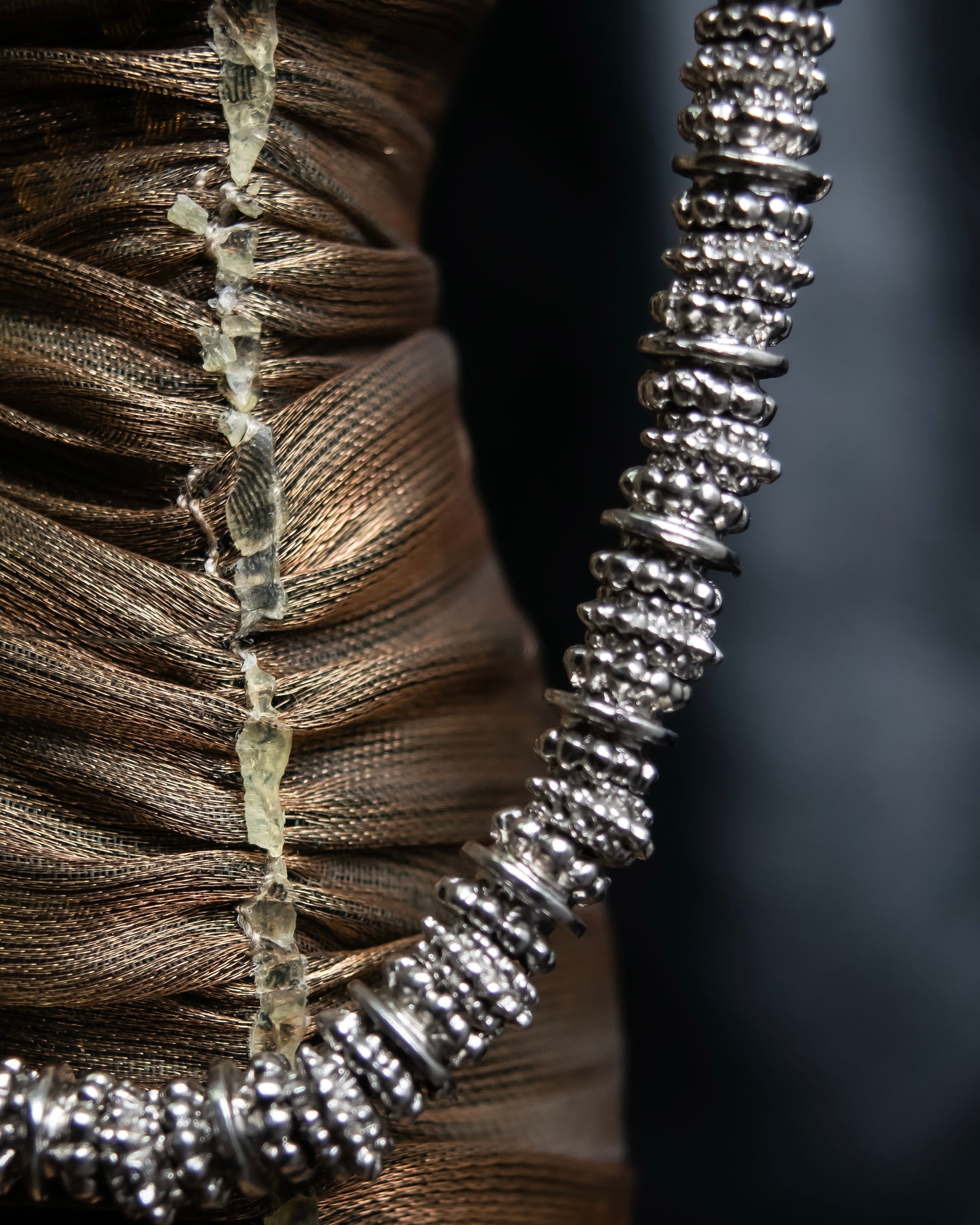 "Yves Saint Laurent"
Different sized beads silver necklace