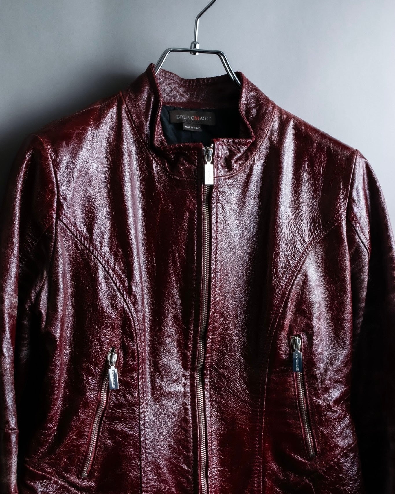 "BRUNOMAGLI" Scratched leather double zip red jacket