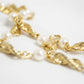 Pearl and gold twist necklace