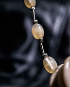 Iron and Wood Cherry Bean Necklace