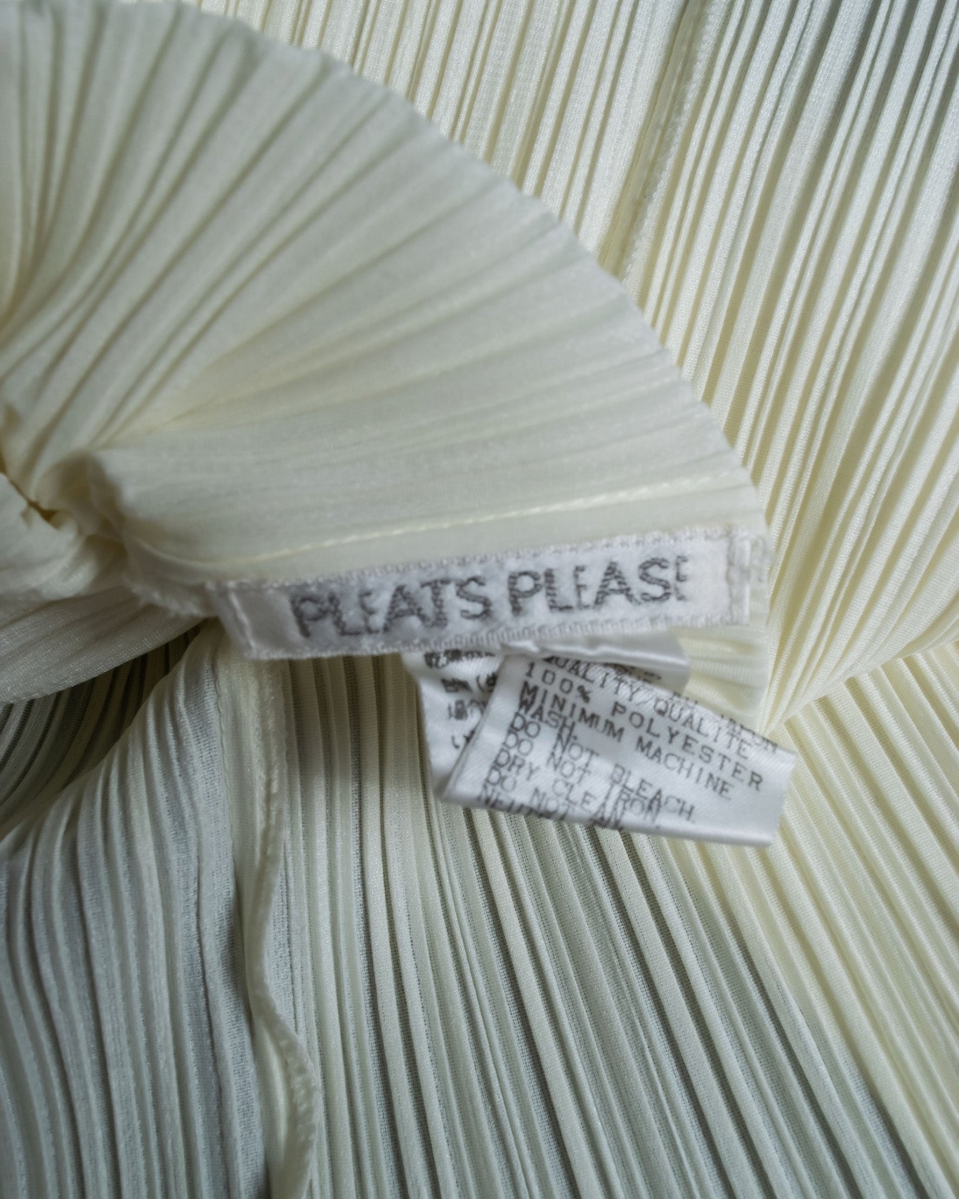 "PLEATS PLEATS" white shirt