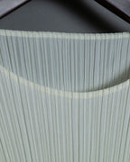 "PLEATS PLEATS" white shirt