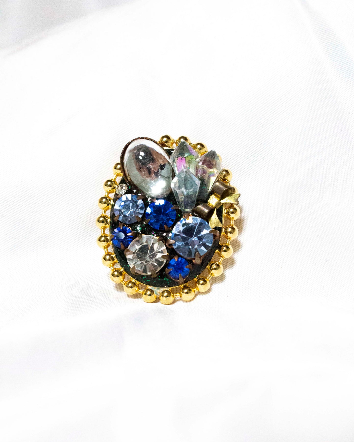 Blue crystal brooch